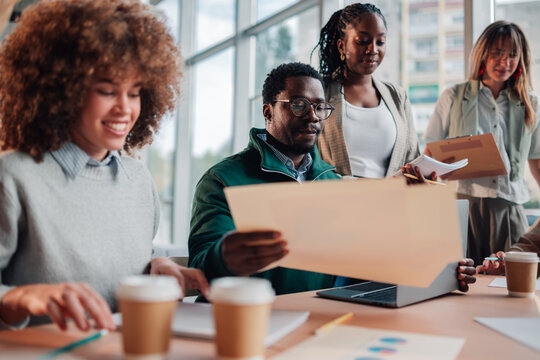 Diverse business team collaborating in an office meeting