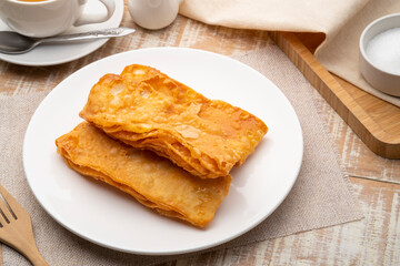 Crispy sweet Roti on white plate,kind of Indian food made of flour