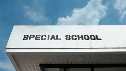 Special School word sign displayed on educational or institutional building under a clear blue sky, symbolizing specialized education, inclusive learning, tailored support, care, student development - Powered by Adobe
