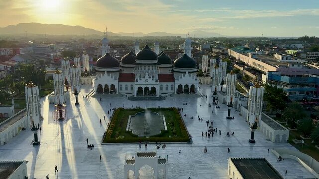 Aerial view of Baiturrahman Grand Mosque in Aceh at the sunset