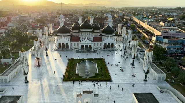 Aerial view of Baiturrahman Grand Mosque in Aceh at the sunset