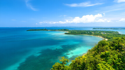 A tropical Australian coastline features a turquoise sea and mountain view from the sandy beach where the blue ocean water meets a summer landscape under a cloudy horizon