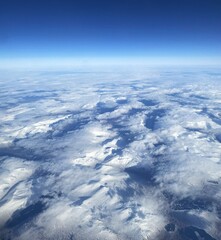 Ice bergs and clouds, view above Iceland, Reykjavik.