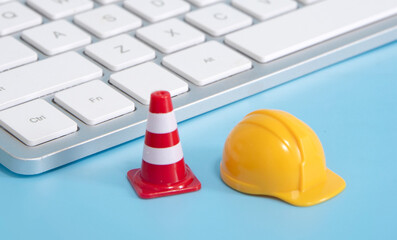 Fototapeta premium warning under construction , website under maintenance , troubleshooting and fixing
