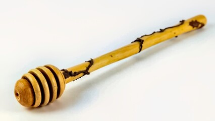 Close up of the wooden honey spoon