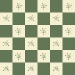 Seamless muted green and beige checkerboard vector pattern with soft snowflakes, cozy vintage winter design for Christmas wrapping paper, textiles and seasonal decorative backgrounds