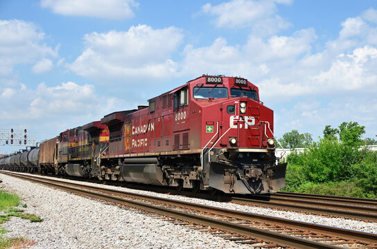 A Canadian Pacific Railway locomotive leads a Canadian Pacific Kansas City ethanol train through suburban Chicago.