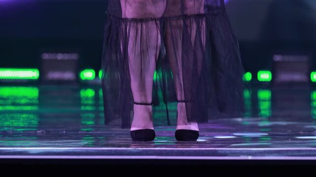 Feet in shoes dancing on stage