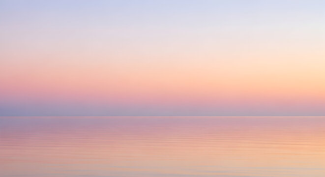 Serene pastel gradient sky over calm water at dawn or dusk - Powered by Adobe