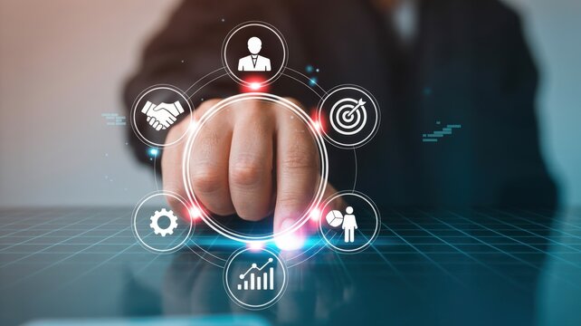 Business professional interacting with a digital interface displaying business strategy icons, symbolizing innovation and growth.