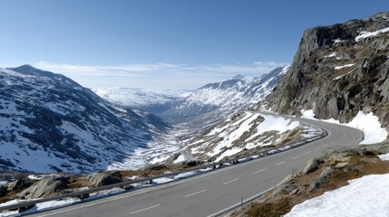 ultra realistic photo of winding road across high mountain pass, rocky cliffs, patches of snow, wide panoramic view