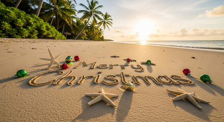 Holiday message Merry Christmas written in sand on tropical beach  