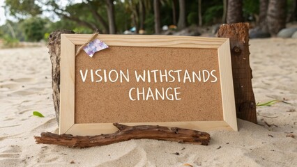 Vision Withstands Change Inspirational Quote on Sand Background