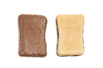 Two Heart-shaped Ice Cream Sandwiches. Two rectangular ice cream sandwiches, one chocolate and one vanilla, with heart designs. Isolated on white background.