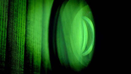 abstract green spectrogram reflected in a lens