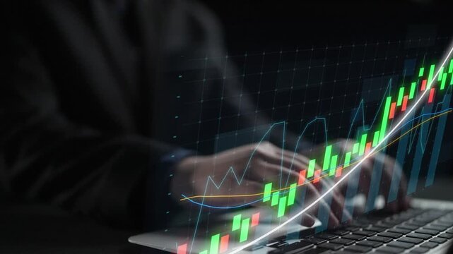 A business professional engages with a digital laptop interface displaying dynamic stock market charts, embodying modern finance analysis in an office environment. Copula - Powered by Adobe