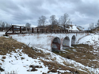 Belozersk, Vologda region, Russia, February, 19, 2020. The old bridge and ramparts of the ancient Kremlin in the city of Belozersk. Russia, Vologda region