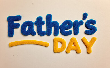 Blue yellow fuzzy letters celebrate fatherhood image