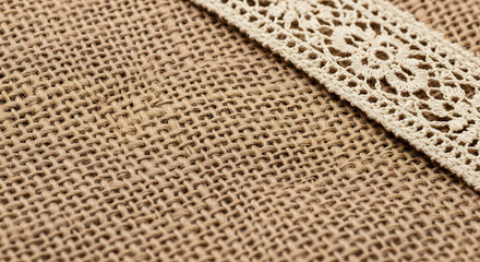 Detailed Textured Burlap Fabric with Delicate Lace Trim, Rustic Elegance Fabric Design Close-Up