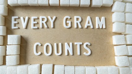 Sugar cube letters spelling Every Gram Counts