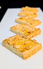 Shortbread Bars Topped with Walnuts and Caramel Drizzle
