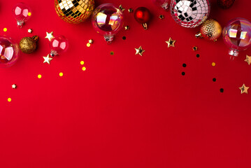 Festive Christmas ornaments on a red background.