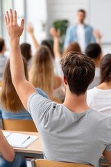 A male student raises his hand to ask a question in a university classroom. A group of young people participating in a lecture. Higher education and active learning concept