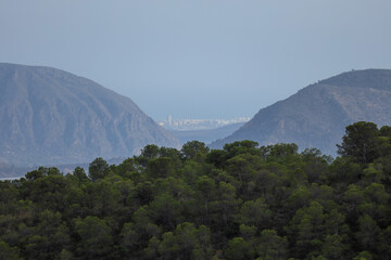 Landscape of the city of Alicante among mountains.