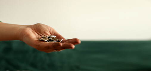 No money concept. close-up of a visibly dirty hand extended in a plea to beg. poor beggar hand...