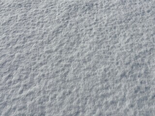 Snow white winter surface background.