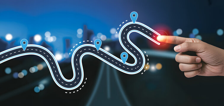 Finger touching end of winding road with location pins