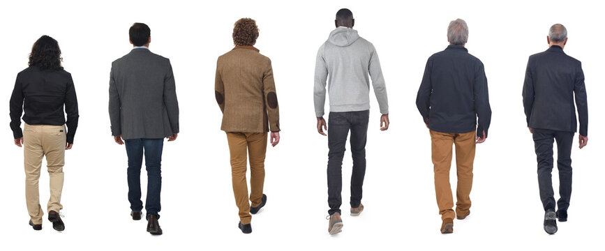 rear view of a group of men walking on white background