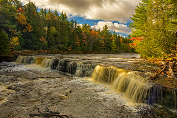 waterfall in autumn forest