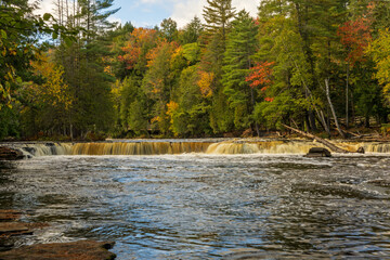 waterfall in forest in autumn
