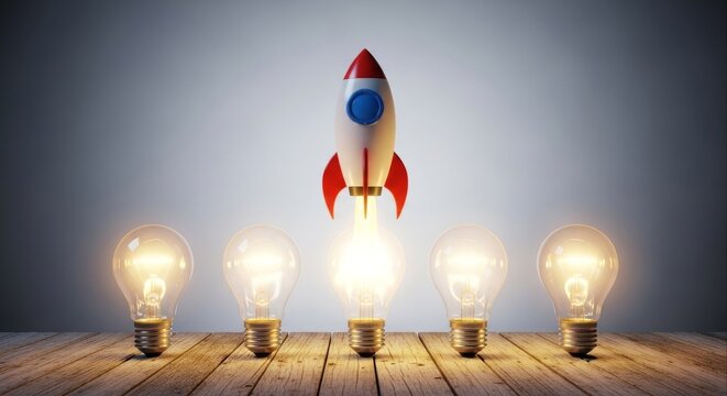 Startup Business Launch Concept With Rocket and Light Bulbs.