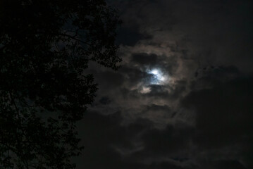 Mysterious Night Sky with Moon and Clouds