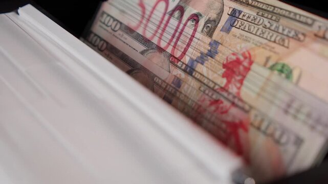 Double-exposure video of US dollar and Russian ruble banknotes in a counting machine, symbolizing global finance, currency exchange, economic power, and international money flow