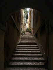 Lisbon street alleyway leading to residential building