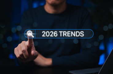 Trends 2026 year concept. Businessman touching search bar with 2026 Trends text. Ideal for future technology, digital innovation, SEO marketing, market forecast, business strategy upcoming trend.
