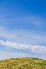hill side grass land sky background landscape nobody