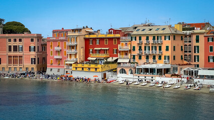 Calm sea and pastel-colored houses create a dreamlike scene in Sestri Levante.