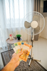Belarusian rubles on a fan, a waste of money