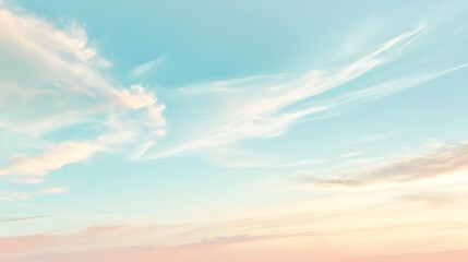 Fototapeta premium A serene sky with soft pastel hues and wispy clouds, creating a calm and beautiful natural scene.