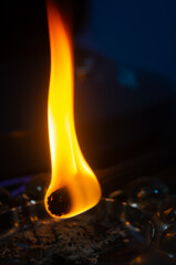 Captivating flame dancing above glass rocks creates a warm and inviting ambiance for cozy nights in or meditative moments of reflection