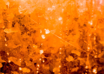Vibrant orange abstract texture with striking patterns perfect for eye catching backgrounds and artistic designs with a warm, fiery aesthetic