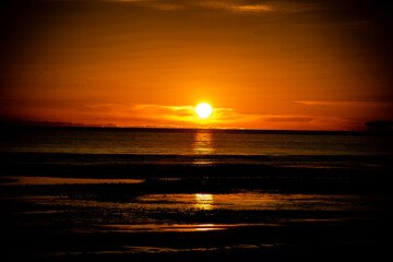Fototapeta premium Sunset over the sea in Homer Alaska
