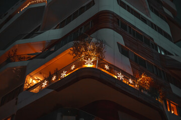 Urban Elegance: An architectural marvel, this building showcases a harmonious blend of modern design with intricate lighting, creating a captivating visual experience.