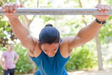 Fototapeta premium Middle age Venezuelan Latin Man training in outdoor park