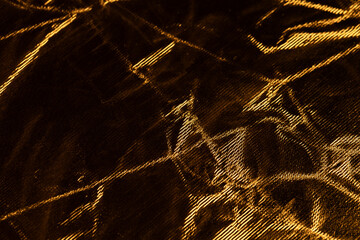 Abstract Gold Crumpled Foil Texture Wrinkled Background