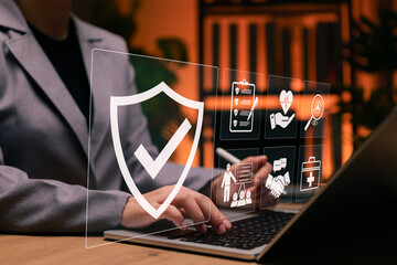 Work safety concept. Businesswoman using laptop with icons for workplace safety, health checklist,...